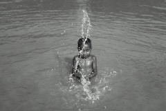 1561-G-Moments-of-pure-joy-—-the-magic-of-water-and-wonder-in-a-childs-playful-world