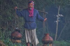 655-G-The-burden-of-date-juice-on-the-farmers-shoulds-on-a-winter-morning